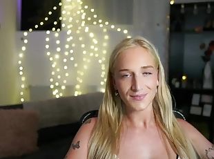 Tattooed blonde babe with nice face solo teasing on cam