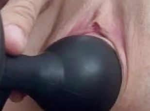 Milf with perfect pussy pumps up inflatable plug inside pussy for extreme stretching