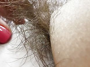 Hairy pussy in white swimsuit closeup