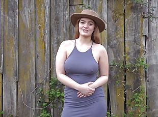 Chubby redhead gal shows her stuff outdoors